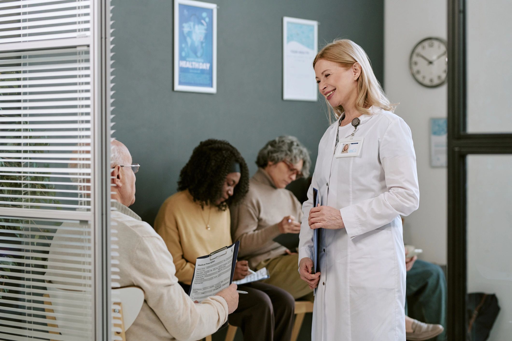 Doctor engaging with patients to represent actionable outcomes